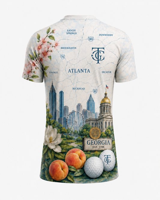 ATL Metro Map All-Over Standard Fit Tee rear view with Atlanta metro map artwork, skyline, peaches, magnolia, and TGC logo.