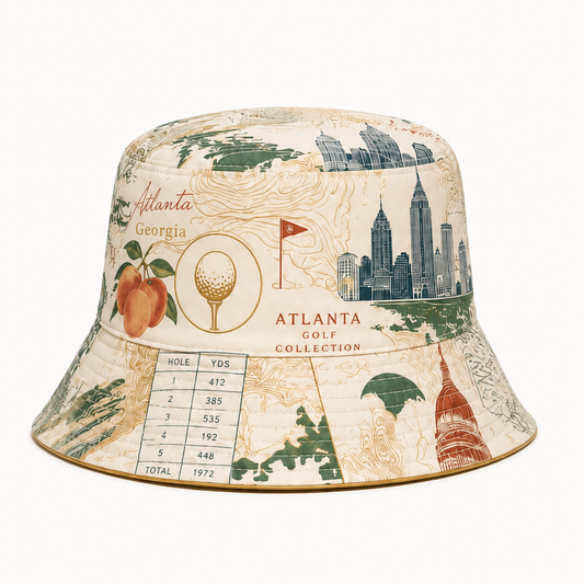 A bucket hat featuring an Atlanta golf-themed collage print with city skyline, golf course map lines, peach illustrations, and a hole scoring table, shown on a plain light background.