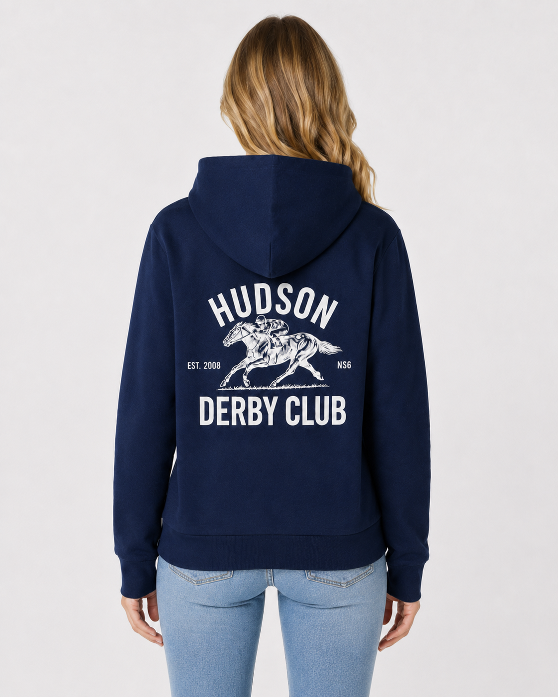 Navy hoodie with 'Hudson Derby Club' text and horse graphic on the back, worn by a person.