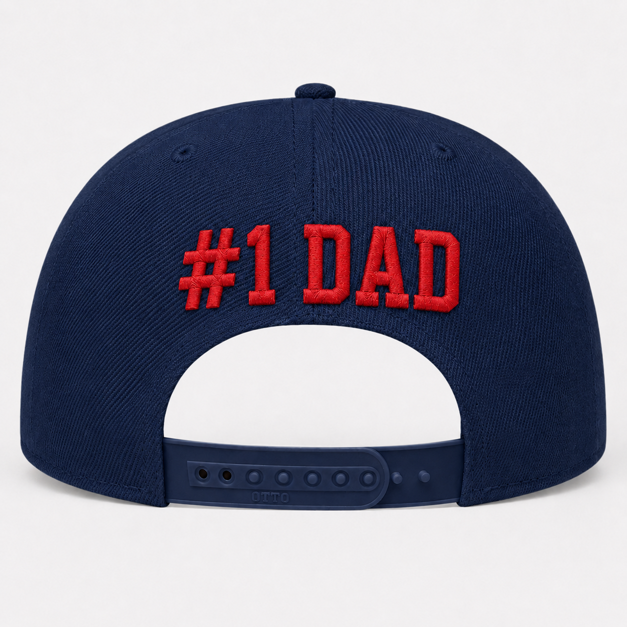 Navy blue cap with '#1 DAD' in red on a light gray background