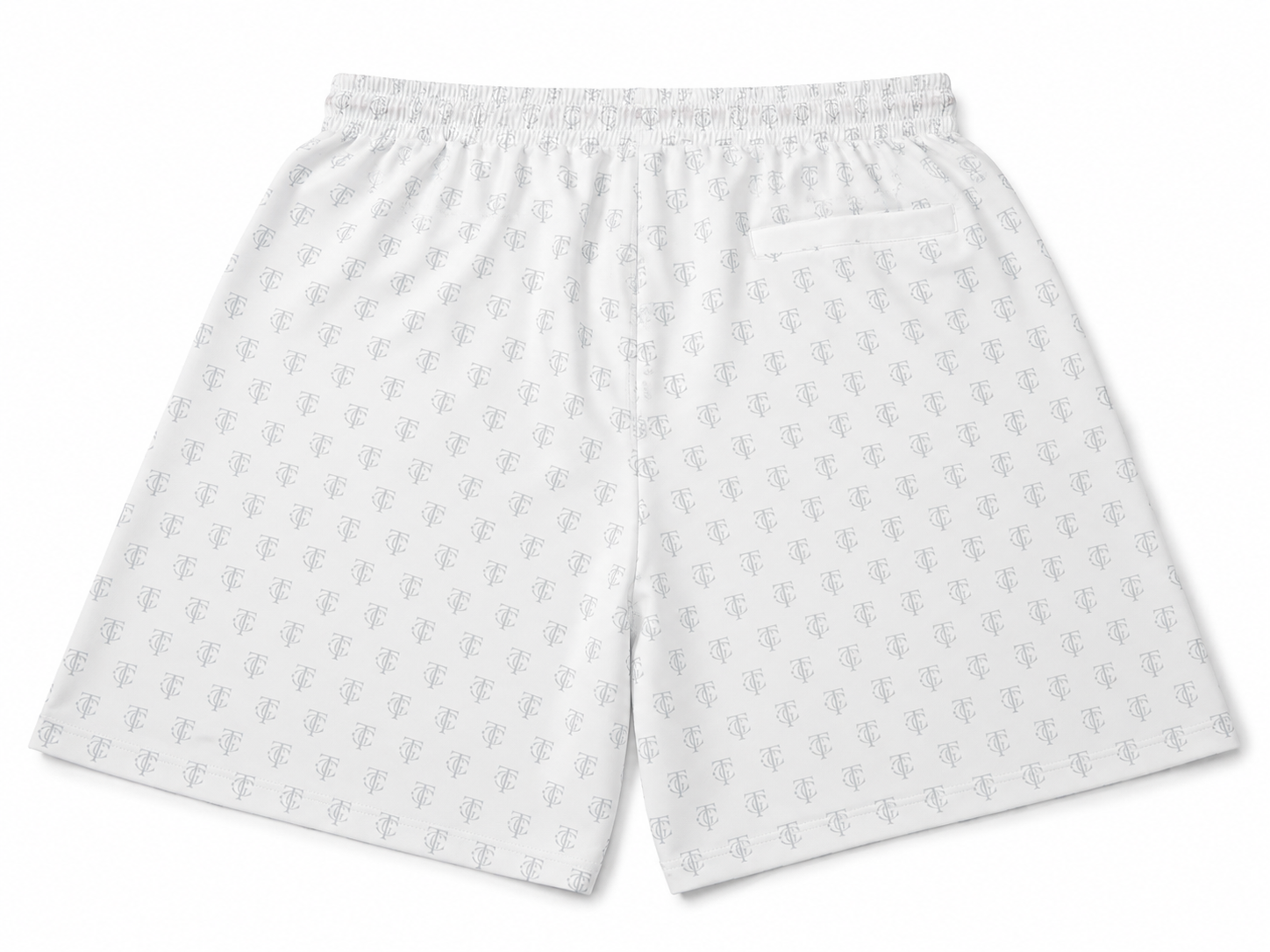 White performance short with a repeating light gray monogram pattern, featuring an elastic waistband and a side pocket.