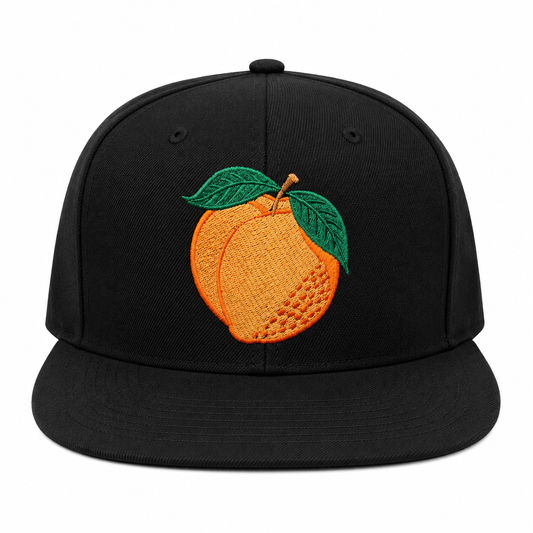 Black cap with an embroidered orange and green leaves on a white background
