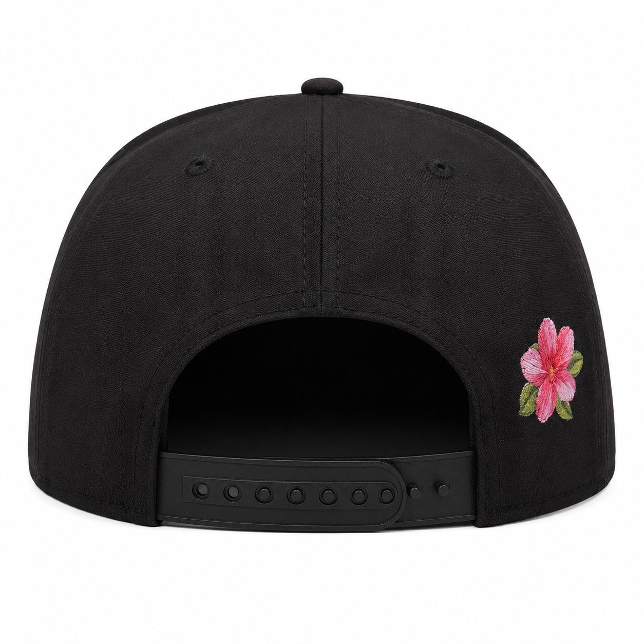 Black cap with a pink floral embroidery on the back against a white background