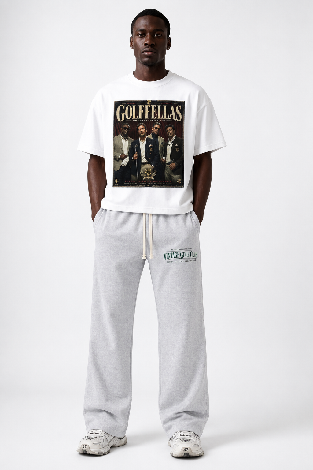 Male model wearing Vintage White Golffellas Vintage Tee with grey Vintage Golf Club sweatpants