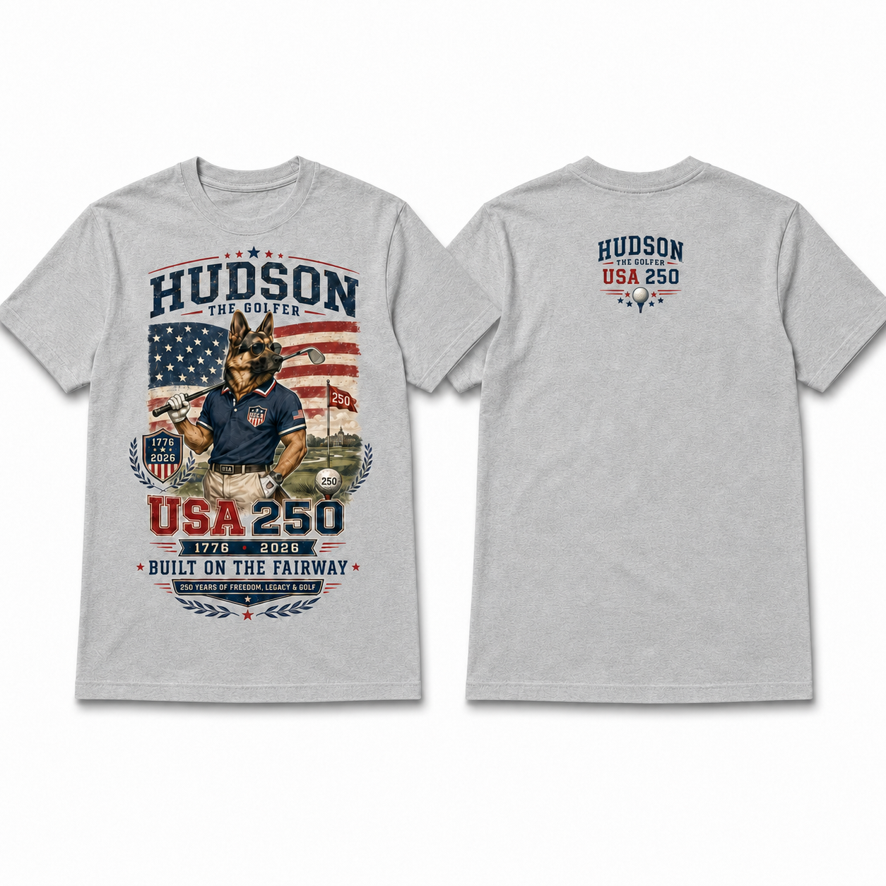 Heather grey Hudson the Golfer USA 250 cotton tee with patriotic American flag golf artwork, Hudson holding a golf club, 1776–2026 detail, and Built on the Fairway text.