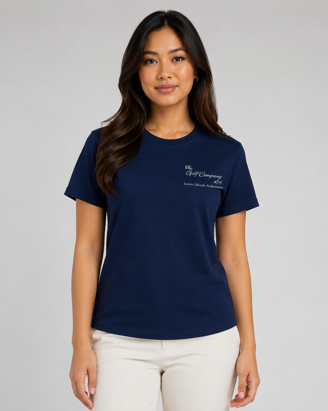 Woman wearing a navy blue t-shirt with text on a gray background