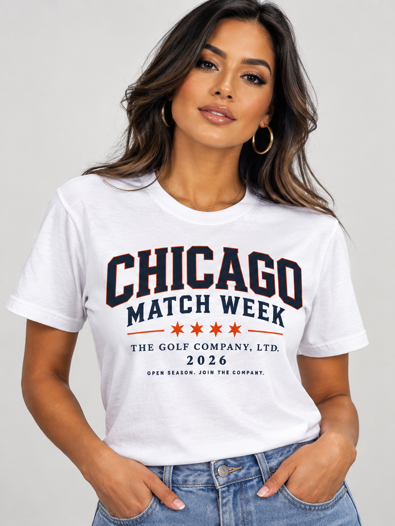 Front view of a Latin female model wearing the white Chicago Match Week City Culture Tee, featuring bold navy-and-orange Chicago Match Week graphics across the chest.