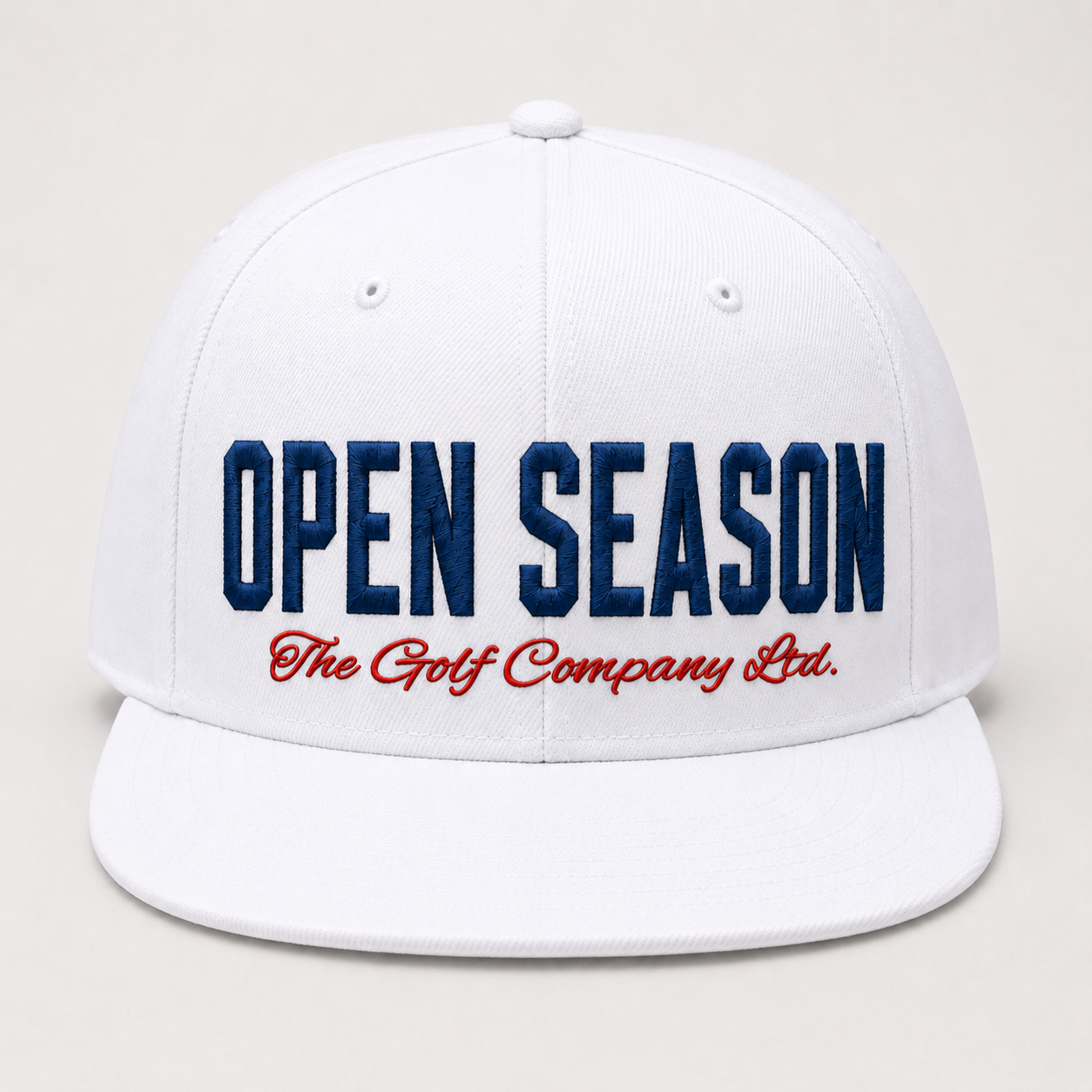 White cap with 'Open Season The Golf Company Ltd.' text on a light gray background