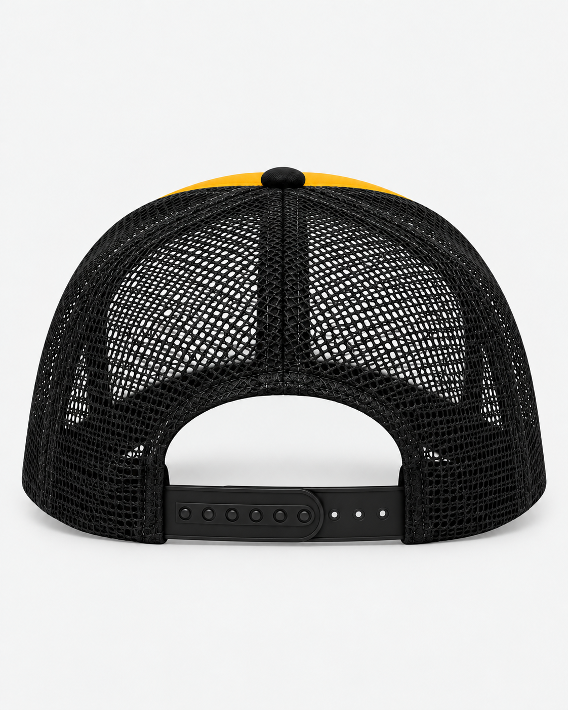Rear view of The Golf Company, Ltd. gold and black Skins Match trucker hat showing black mesh back and adjustable snapback closure.