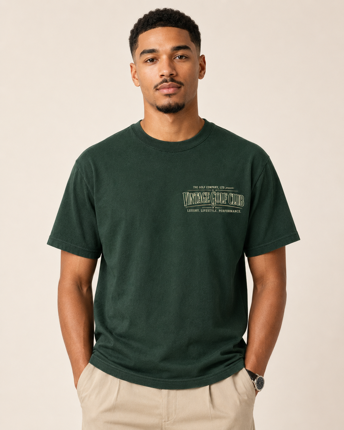 Forest green Sir Hudson Southport Links Edition tee with Vintage Golf Club chest logo on male model.