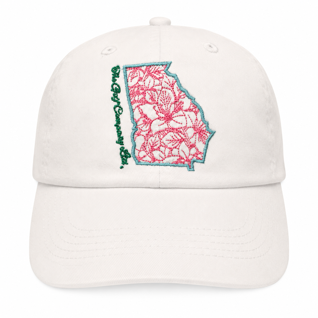 White cap with pink and green embroidered design on a white background