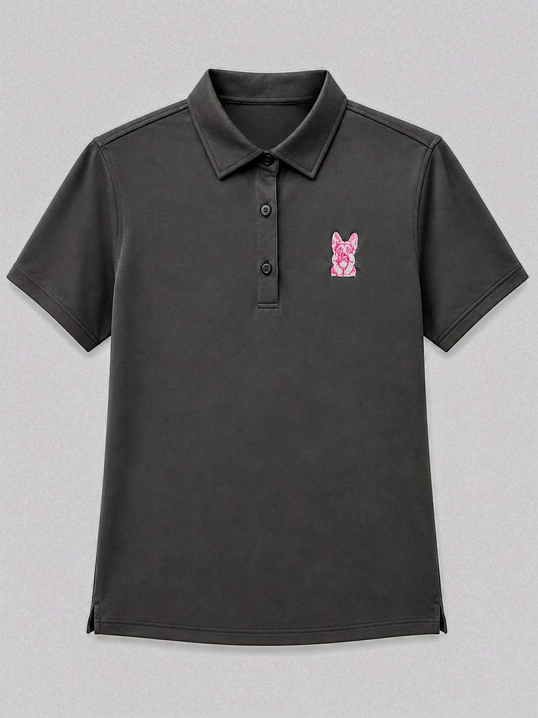 Women’s black performance golf polo front view with pink embroidered Hudson dog logo by The Golf Company Ltd.
