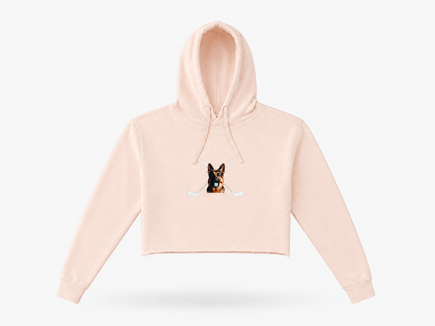Women’s soft blush crop hoodie front view with Hudson dog and crossed clubs logo by The Golf Company Ltd.