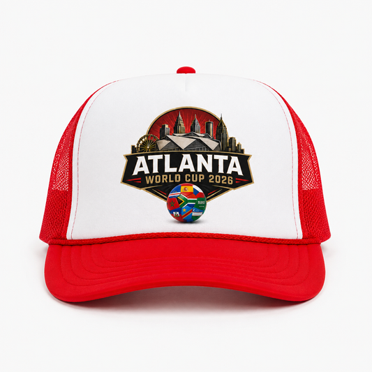 Red and white Atlanta 2026 trucker cap with skyline crest artwork, stadium graphic, and multi-nation soccer ball on the front panel.