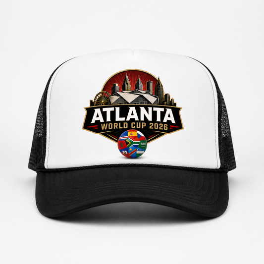 Black and white Atlanta 2026 trucker cap with skyline crest artwork, stadium graphic, and multi-nation soccer ball on the front panel.